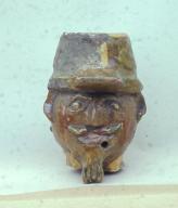 fragment de statuette : tête de soldat