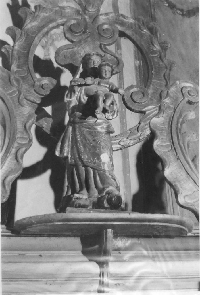 ensemble du maître-autel : autel tombeau, tabernacle à ailes, exposition, statue (statuette) : Vierge à l'Enfant, 2 statues (statuettes) : Orant, et 2 portes